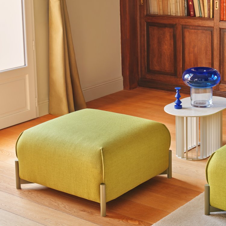 Single Linka pouffe with green upholstery