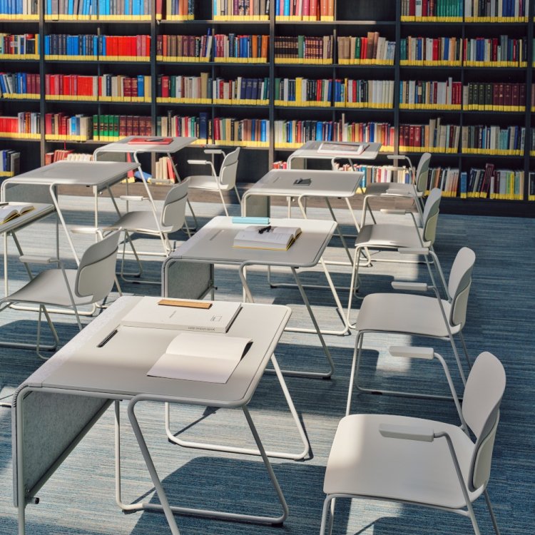 A library interior arranged with grey Loop desks and Lena chairs